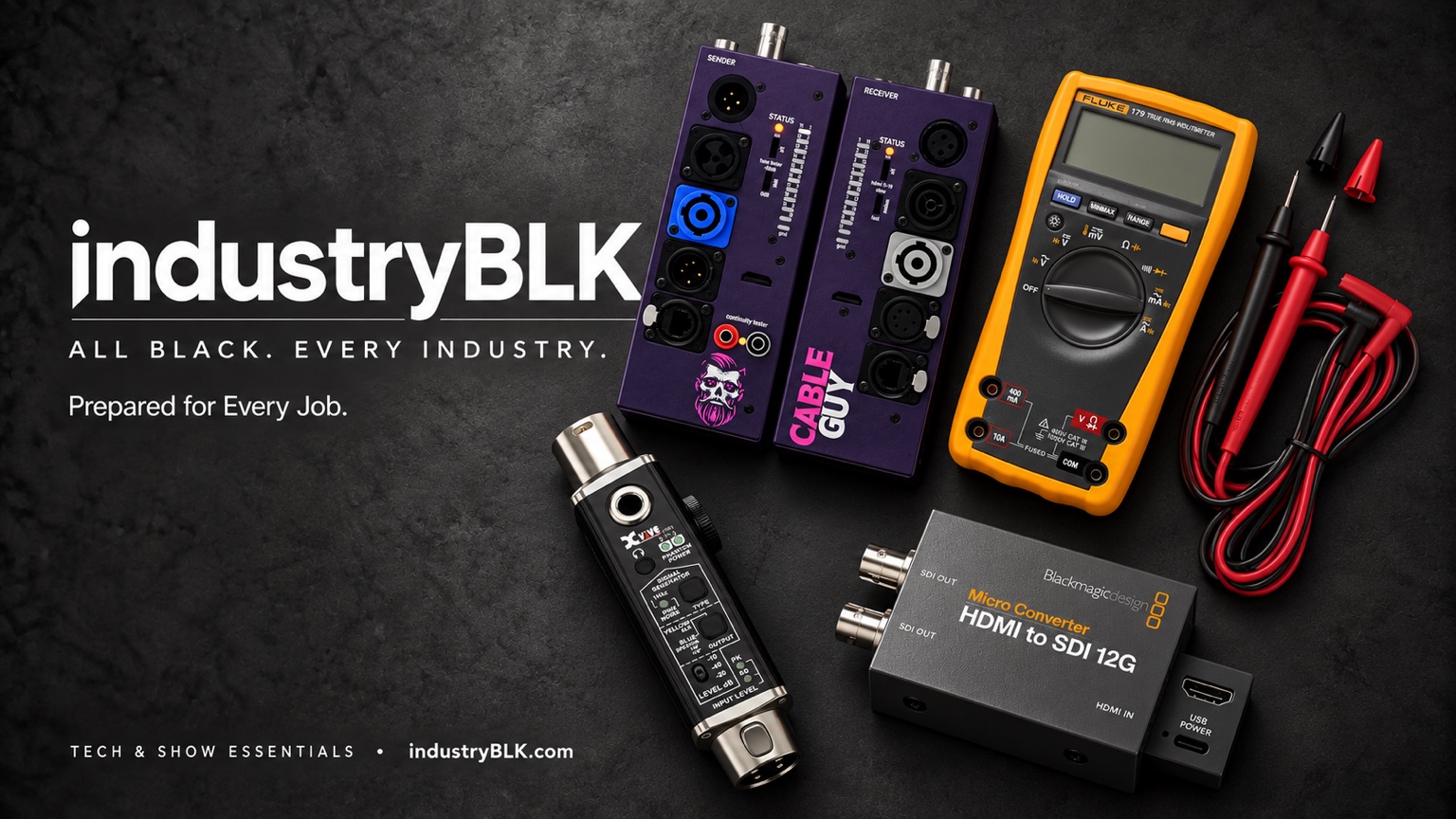 IndustryBLK Tech & Show Essentials showcase with cable testers, multimeter and signal-conversion gear.